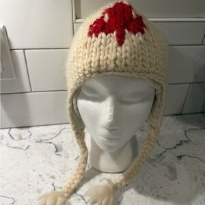 100 percent wool CANADA toque with earflaps &  tassels 
OS warm, attractive!
